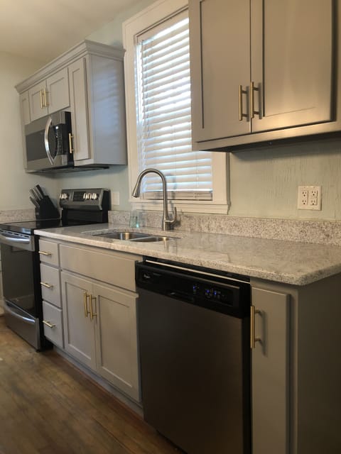 A dishwasher is provided for your convenience.