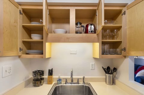 Our kitchen has everything you need for feasting on carry out or cooking a gourmet meal.