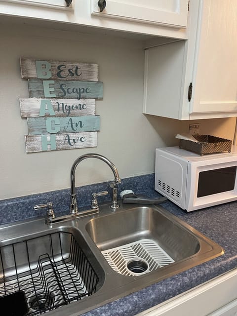 The sign says it all about your stay at The Cute Condo on The Boulevard 