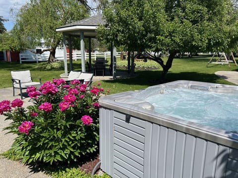 Unwind in the outdoor hot tub, offering a perfect way to relax under the stars after a day of adventure