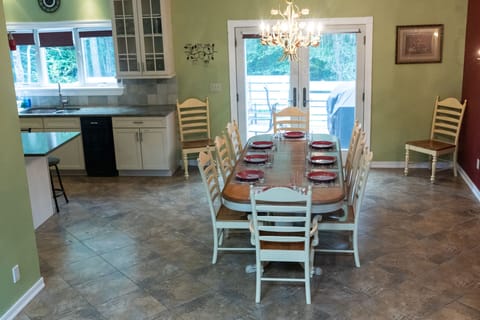 beautiful kitchen table with seating for 10