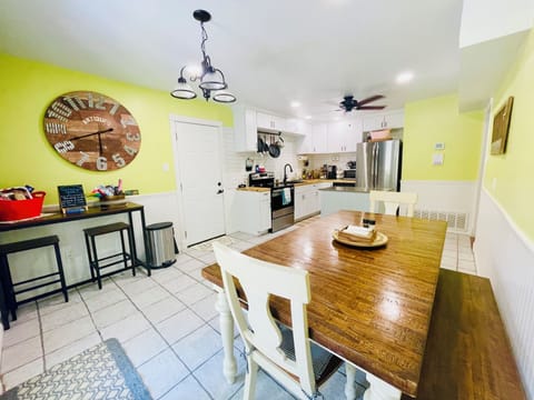 Kitchen w/ coffee maker, pots and pans, toaster, microwave, blender, and more!