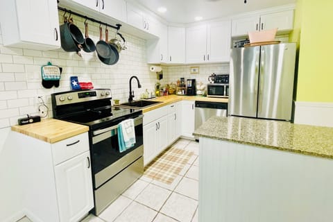 Complete with baking supplies, serving dishes, crockpot, ice cream maker, & more