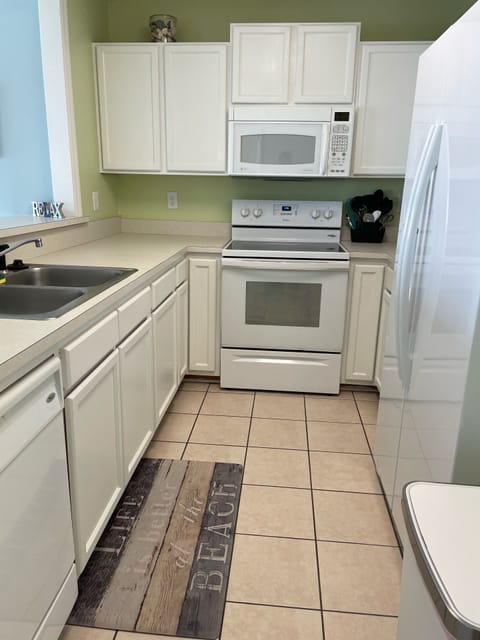 Fully stocked kitchen with pots, pans, utensils and everything else you need
