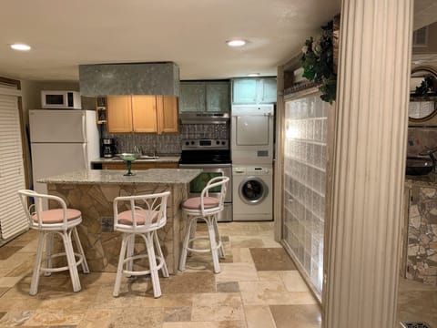 complete kitchen and utensils, and for your convenience, Bosch washer and dryer