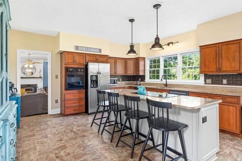 You will enjoy cooking on the high-end cooktop built in to the kitchen island