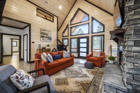 Main living area and stacked rock fireplace