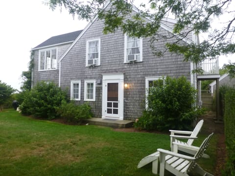 Side yard and front door