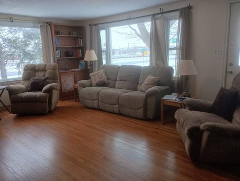 Living Room with couch and recliners