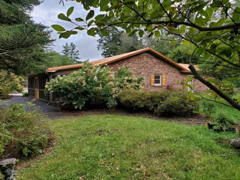 Side of home on left.