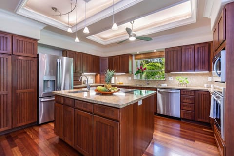 Gourmet kitchen with all stainless steel appliances.