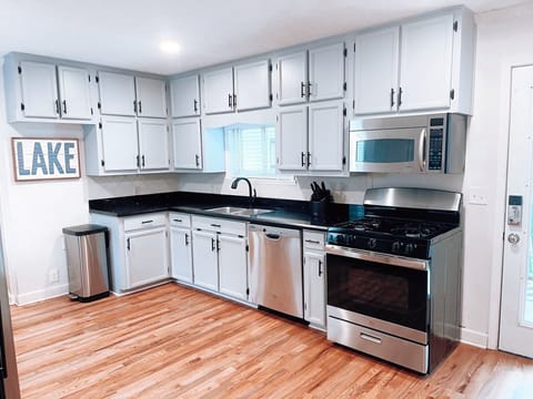 Spacious kitchen, fully equipped for cooking/eating.