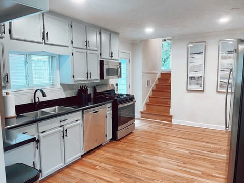 Spacious kitchen, fully equipped for cooking/eating.