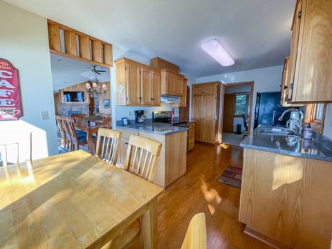 Kitchen from kitchen table. 