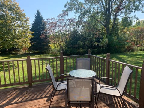 Enjoy the deck overlooking the peaceful backyard