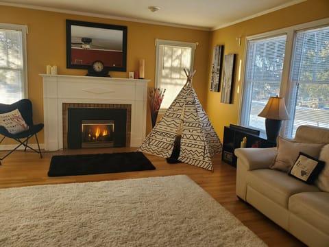 Spacious living room area; for lounging, playing games, or watching tv.
