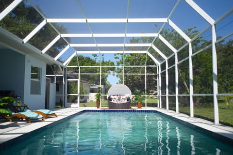 Salt water, heated pool. 

Unfortunately hurricane Ian destroyed our pool cage. 