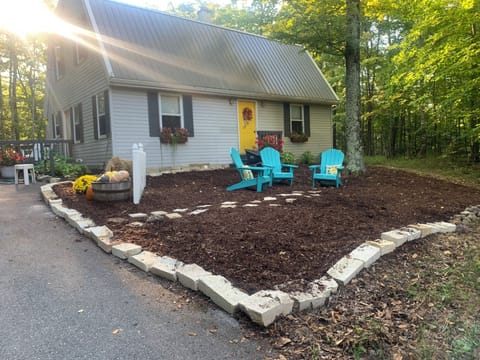           TUCKED AWAY
Front yard sitting area—decorated for Autumn 2024