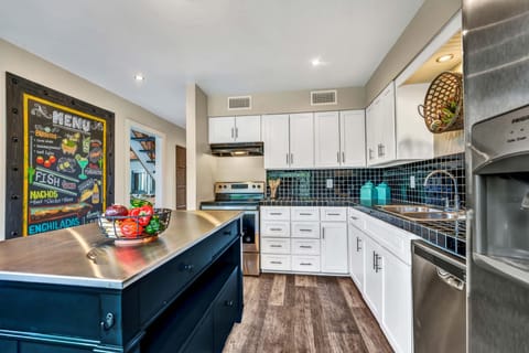 Fully stocked kitchen with pots/pans, bakeware, mixer, blender and more!