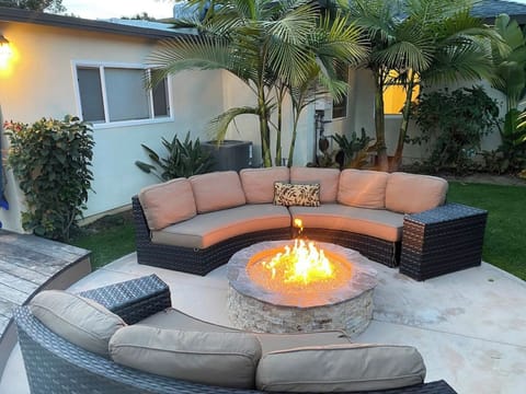 Steps from sand- Lounge around large firepit