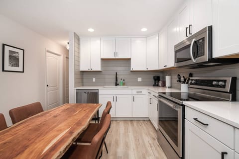 Our kitchen features ample cabinetry and all the essentials for a gourmet vacation meal.