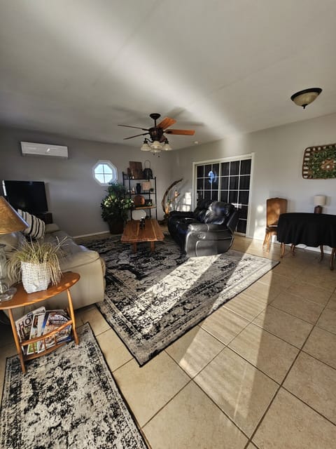Living and dining area.  Adjoining door always remains locked. 