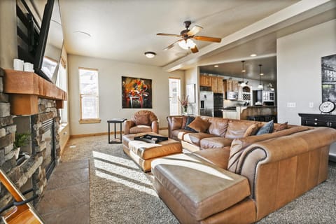 Family Room with comfortable Seating and Fireplace with view of the Valley.