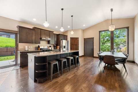 Kitchen and Dining with patio access. Fully equipped kitchen for cooking meals and coffee bar!