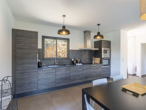 Table, Property, Cabinetry, Furniture, Wood, Countertop, Living Room, Lighting, Interior Design, House