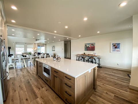 Spacious kitchen and dining area perfect for gathering, cooking, and making unforgettable memories together.
