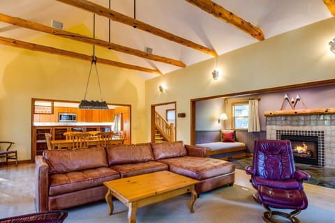 Open concept living room-- the dining room, kitchen, fireplace sitting room 