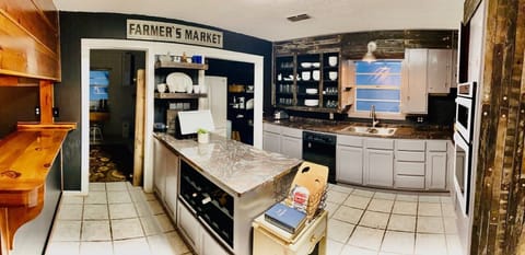 Kitchen features plank wine staves on the walls from Becker Vineyards