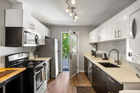 Brookwood Courtyard Condos - Complete Galley Kitchen with Full-Size Appliances