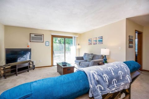 Living space- Couch, loveseat and smart TV