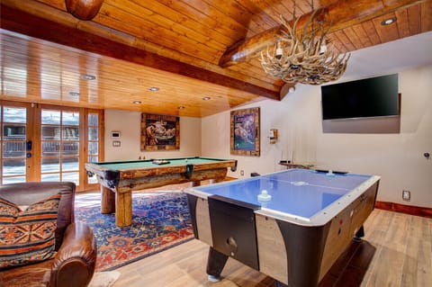 A Big Bear Game Room like no other -THREE 60” smart TV’s, 2 arcade games & more!