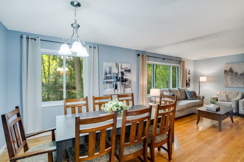 Main level dining room and living area combined to seat 14.