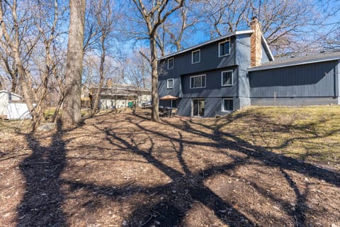 Back of the home with beautiful views of nature. 