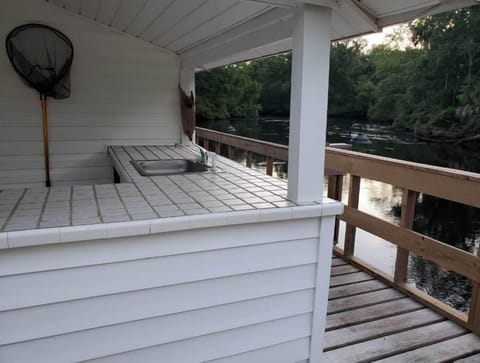 Exterior sink for grilling and food prep .