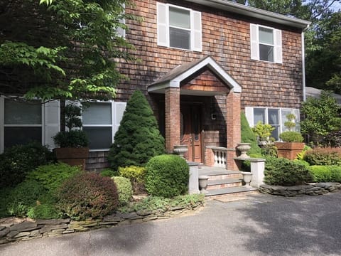Front of house with circular driveway