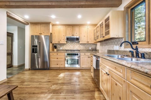 Gorgeous granite countertops provide plenty of workspace for the chef.