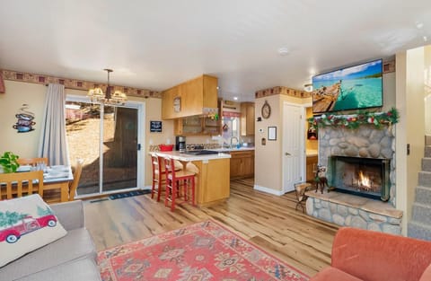 Living Area with 50" Smart TV w/ Netflix, HBO Max, Paramount+, Disney+ included.