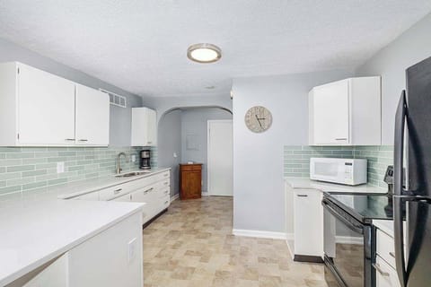 Kitchen and back hall to bathroom