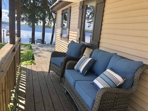 One of two outdoor sitting areas. Under a covered porch