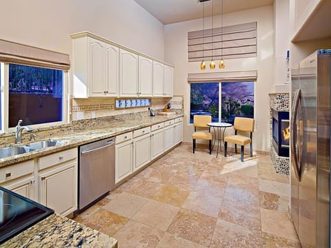 Upgraded kitchen with quality appliances and granite counters.