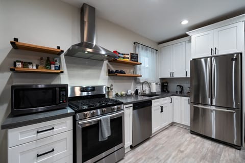 Full kitchen with a coffee maker, water kettle, coffee, teas, etc.!