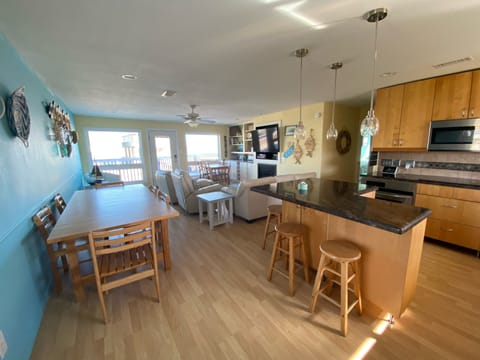 View from kitchen to dining area and living room