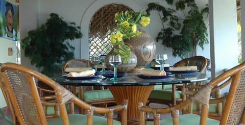 Dine under the Palapa overlooking the ocean
