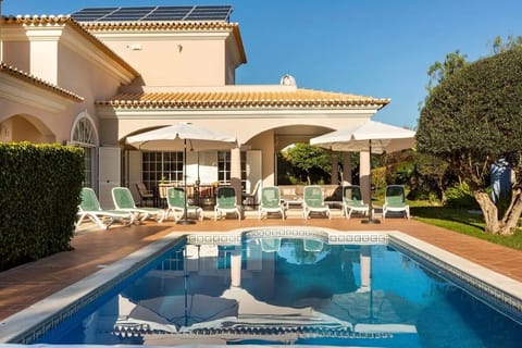 Front of the house with pool view