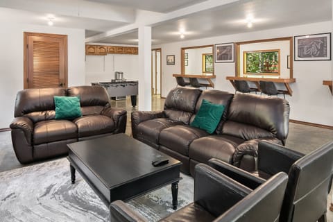Highlander Lodge: - Garage game room with a comfortable TV Lounge.