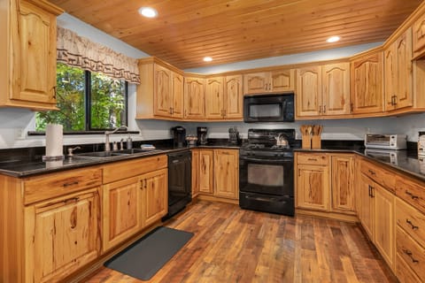 Highlander Lodge - Main Kitchen with a gas cooktop.